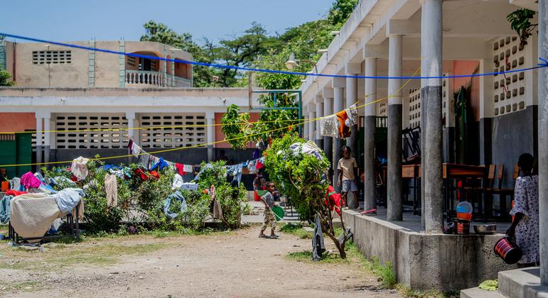 Desks become beds as Haitian school shelters people displaced by violence